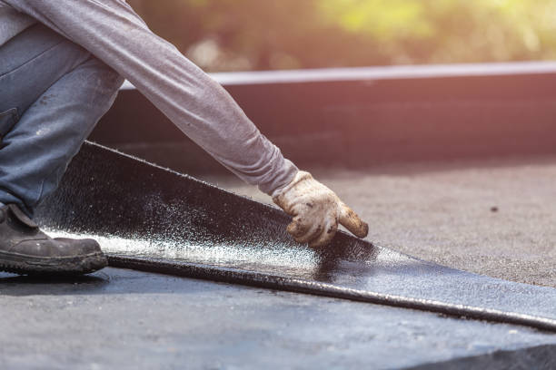 Professional Waterproofing technician working in Eau Claire, WI